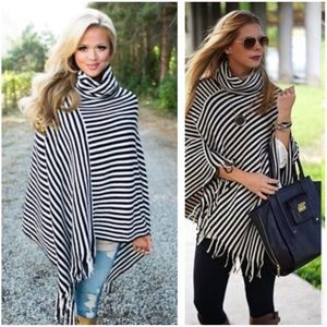Stripped poncho. Cream and black stripes.